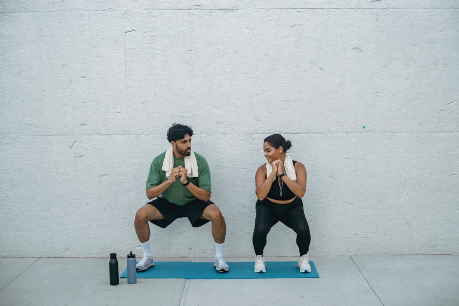 Man and woman exercising outdoors on a yoga mat, focusing on squats and healthy lifestyle.